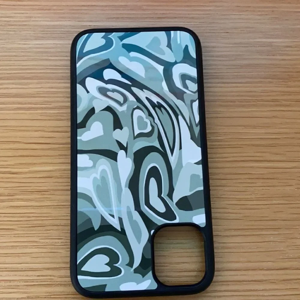Various IPhone 11 cases including wallflower case